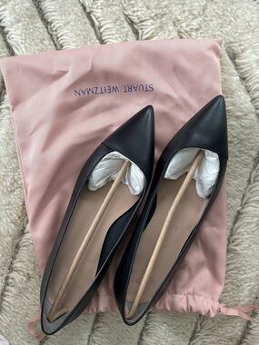 Stuart Weitzman Black Pointed-Toe Leather Flats with Nude Insole